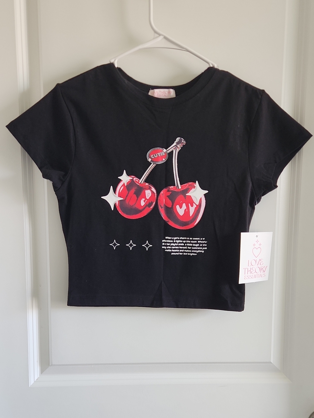 Love Theory Essential Black Tee with Red Cherry Graphic and White Accents
